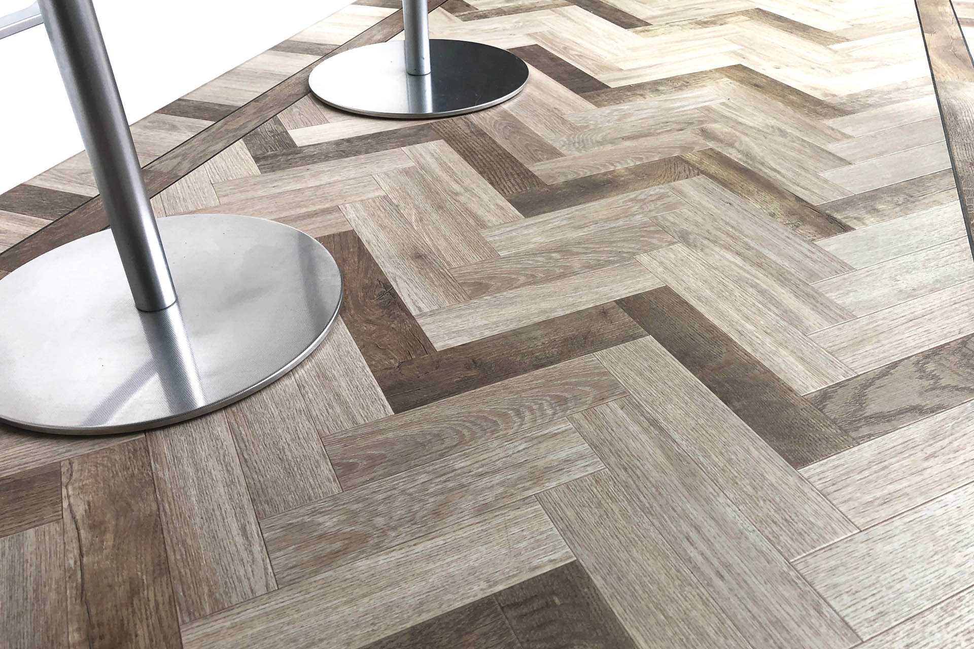 PVC flooring in herringbone motif