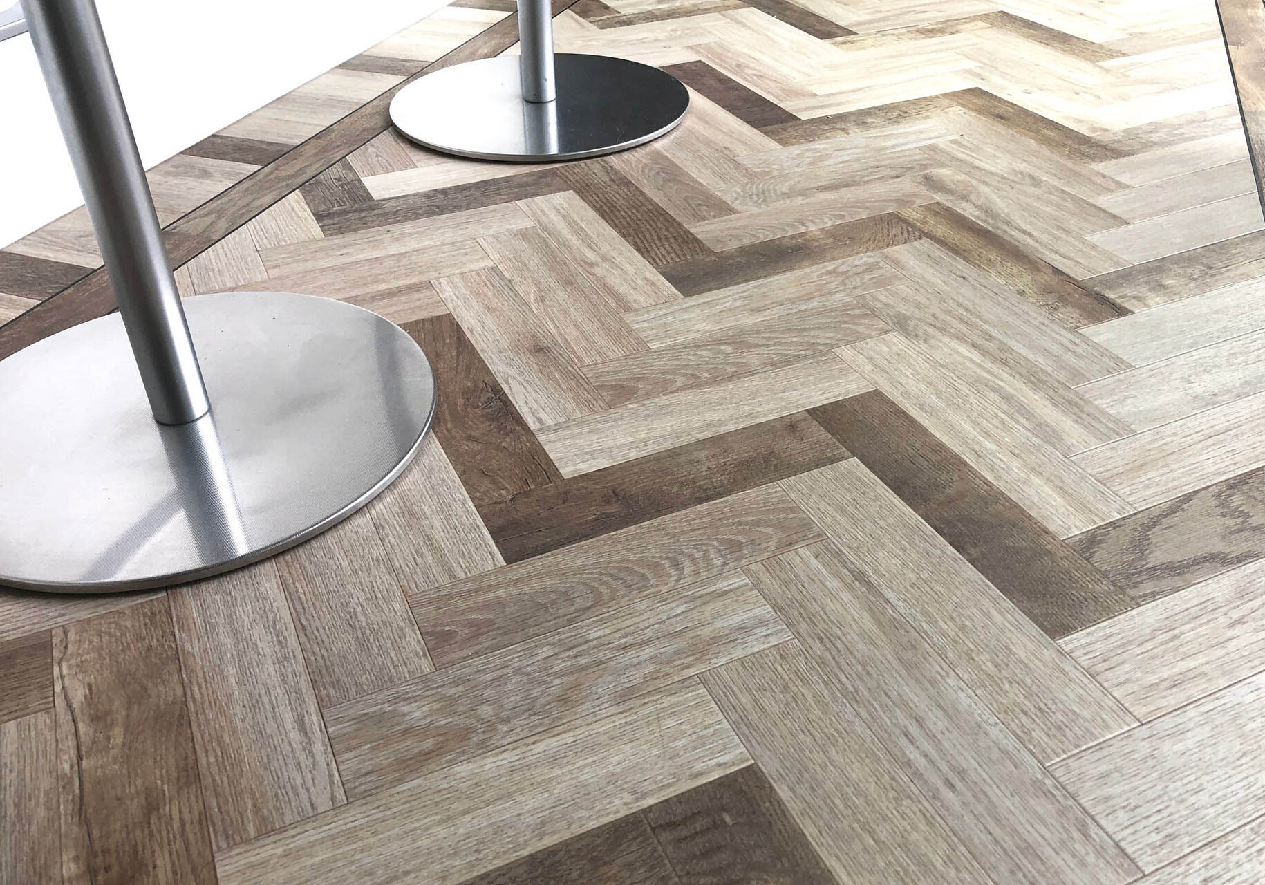 PVC flooring in herringbone motif